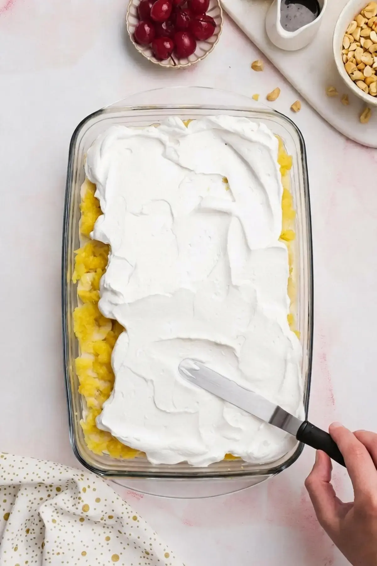 Banana Split Cake, Step 5: Spread Cool Whip